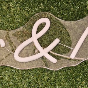 Mr & Mrs" LED neon sign illuminated in cool white [for rent]