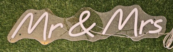 Mr & Mrs" LED neon sign illuminated in cool white [for rent]