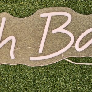 Oh Baby" LED neon sign illuminated in cool white [to rent].